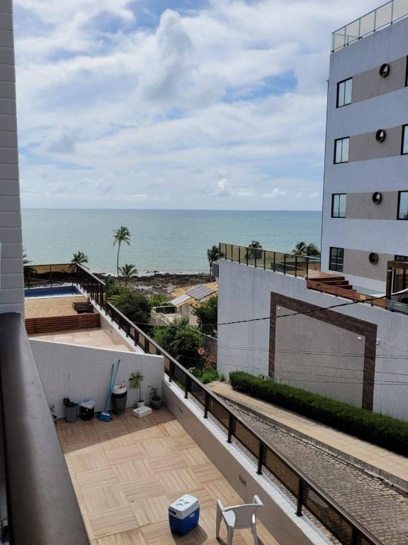 a view of the ocean from the balcony of a building at Sol morena 1 in Conde