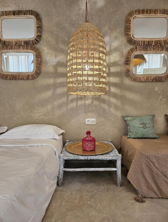 Postel nebo postele na pokoji v ubytování Miostello Lifestyle Riad Marrakech