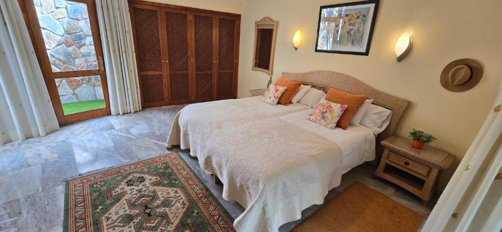 Łóżko lub łóżka w pokoju w obiekcie Villa Luxe Tauro Mogan