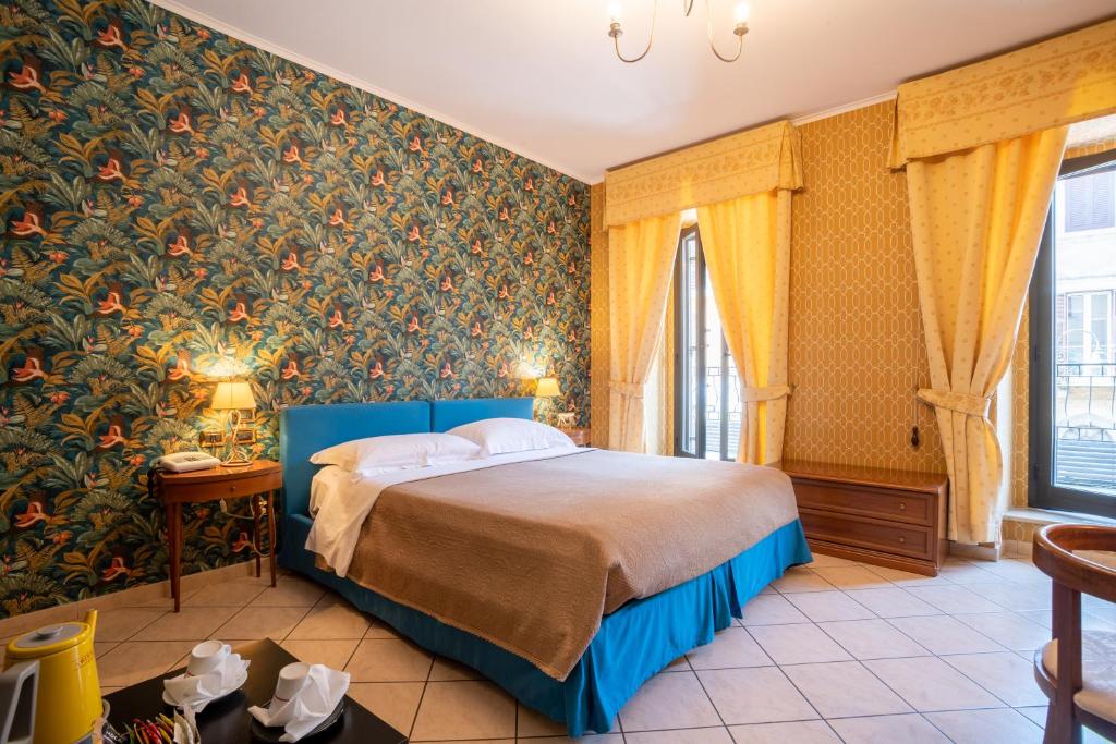Postel nebo postele na pokoji v ubytování Locanda Da Otello