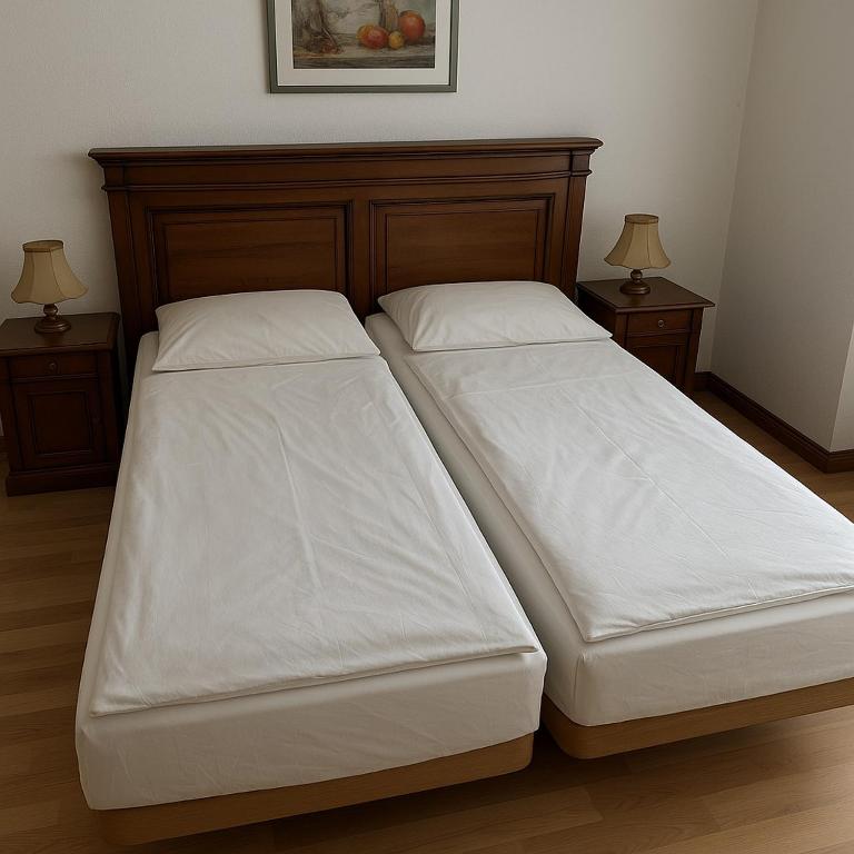 Postel nebo postele na pokoji v ubytování AM RATSHOF