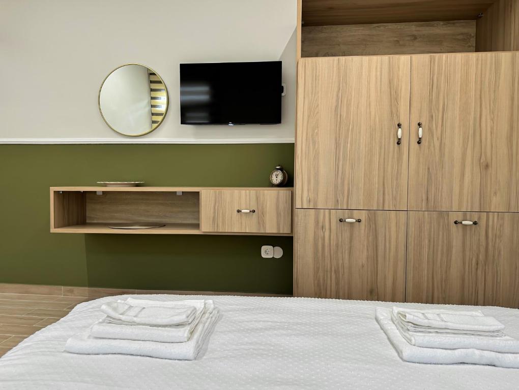 Postel nebo postele na pokoji v ubytování Elden Bnb Xanthi