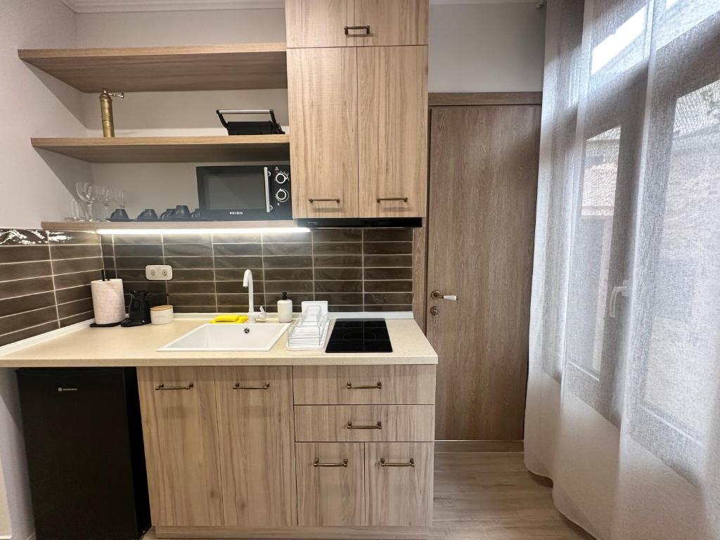 Kuchyň nebo kuchyňský kout v ubytování Elden Bnb Xanthi