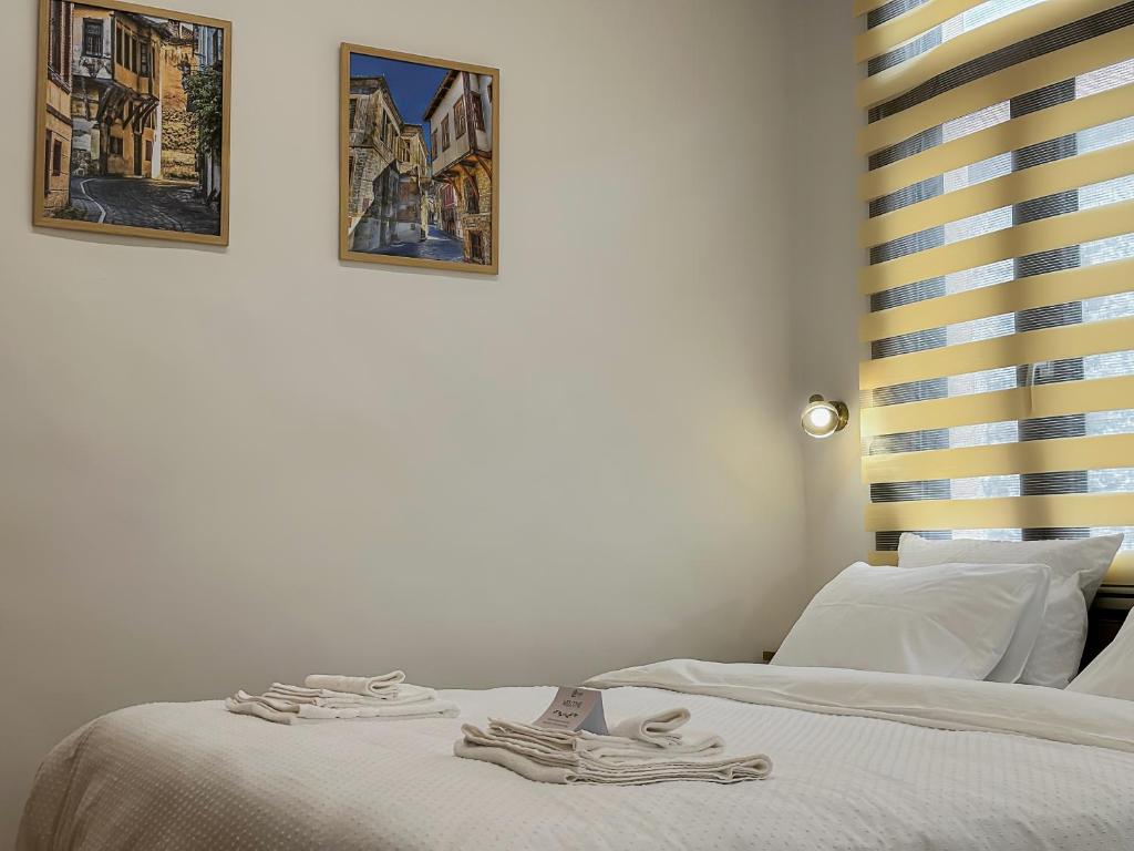 Postel nebo postele na pokoji v ubytování Elden Bnb Xanthi
