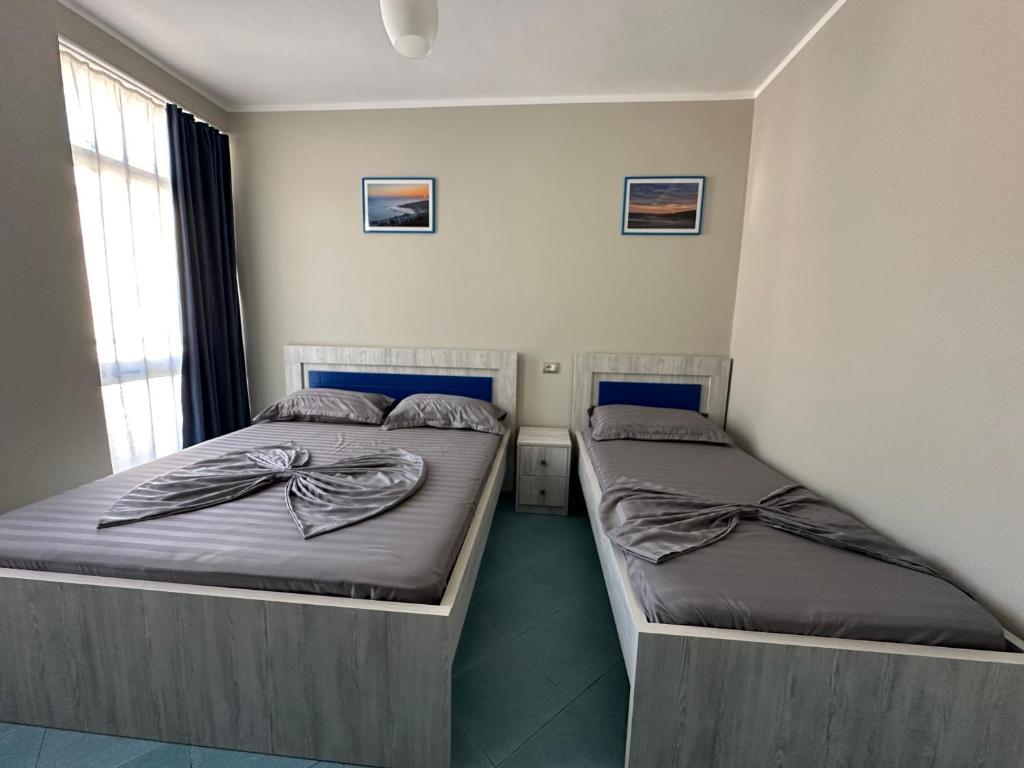 Postel nebo postele na pokoji v ubytování Eri Apartments 4