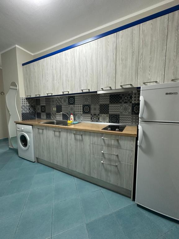 Kuchyň nebo kuchyňský kout v ubytování Eri Apartments 4