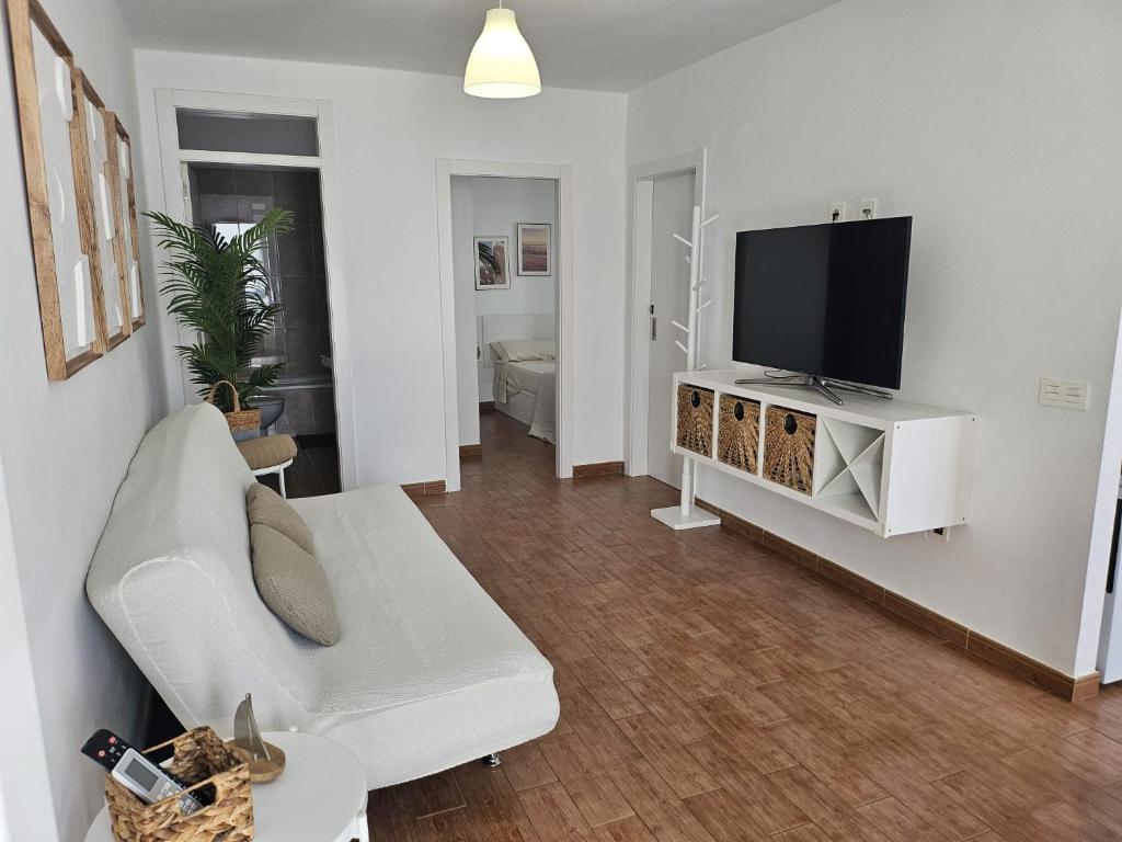 TV a/nebo společenská místnost v ubytování Ideal 3