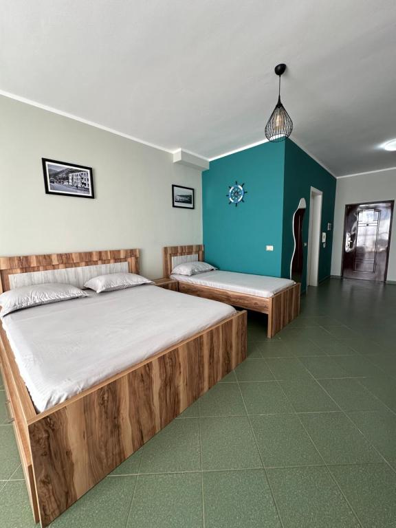 Postel nebo postele na pokoji v ubytování Eri Apartments 4