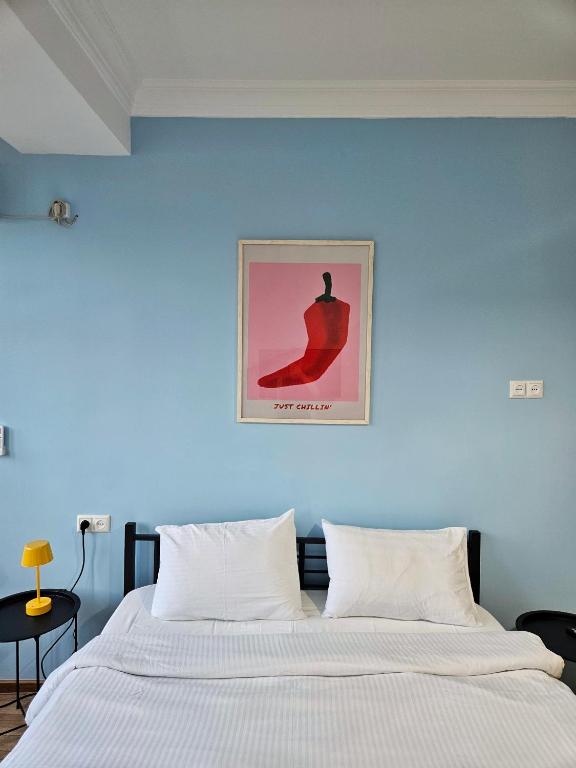 Postel nebo postele na pokoji v ubytování Sunny Hotel Tbilisi