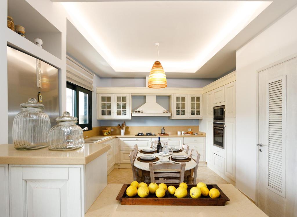 Kuchyň nebo kuchyňský kout v ubytování Aphaia Home