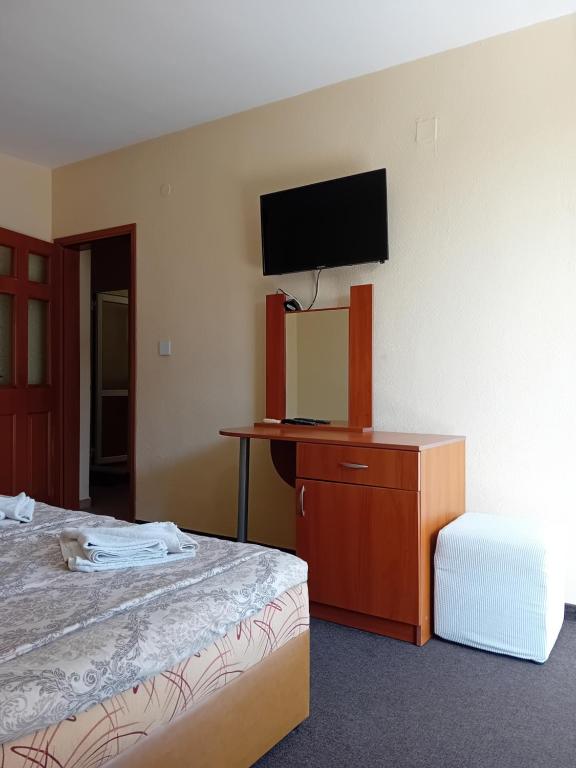 Postel nebo postele na pokoji v ubytování Laura 2