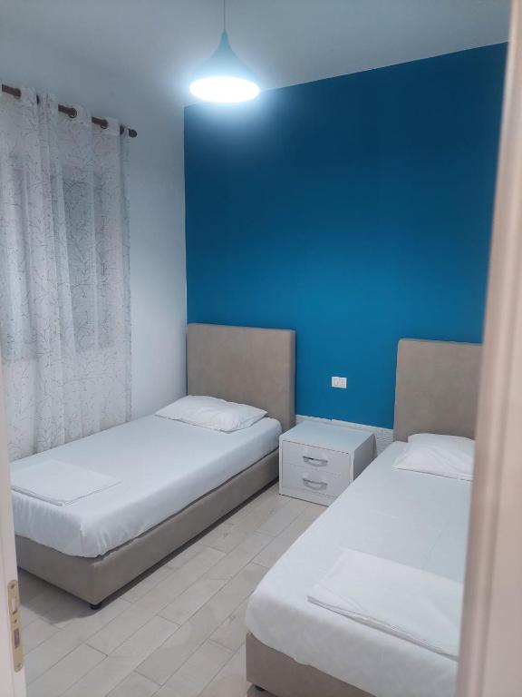 Postel nebo postele na pokoji v ubytování Villa 69 - Jonufer
