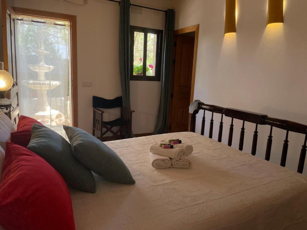 Postel nebo postele na pokoji v ubytování La Pérgola Habitaciones Rústicas