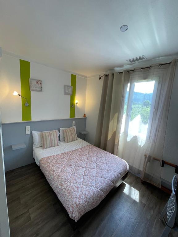 Postel nebo postele na pokoji v ubytování Hotel Clair Logis
