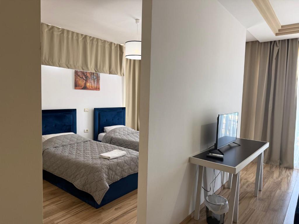 Postel nebo postele na pokoji v ubytování AMĀIA Hotel & Restaurant