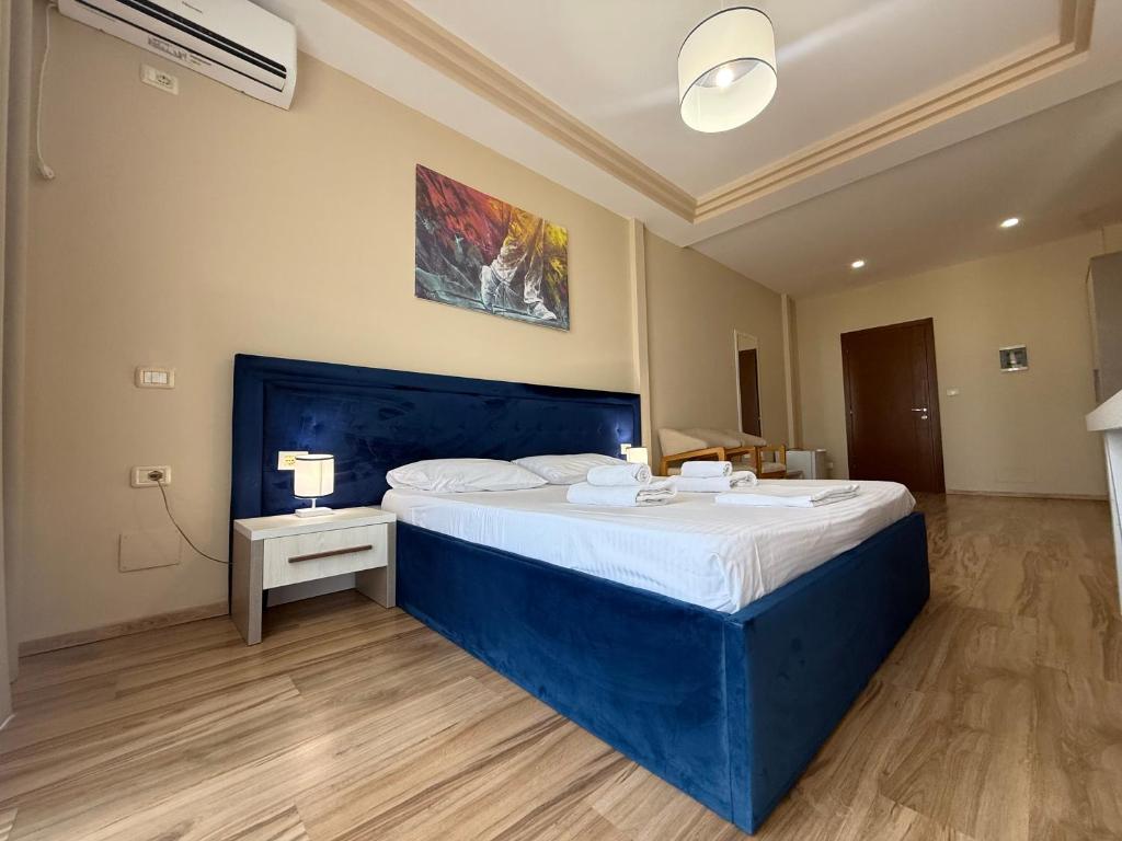 Postel nebo postele na pokoji v ubytování AMĀIA Hotel & Restaurant