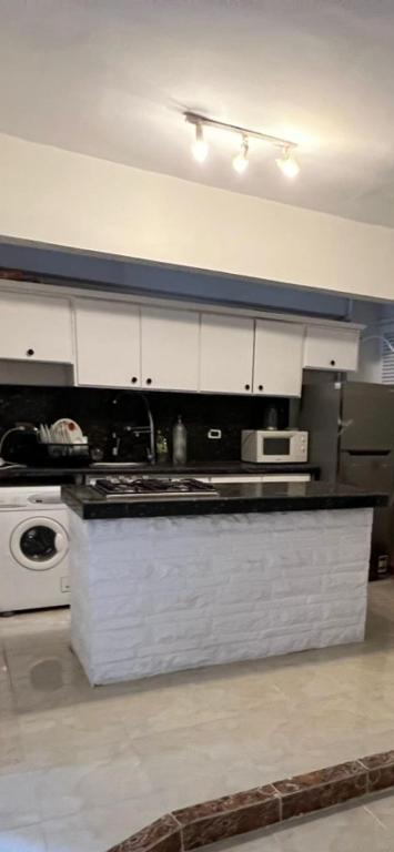 Kuchyň nebo kuchyňský kout v ubytování Mohamed Home