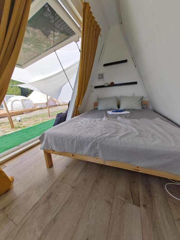 Postel nebo postele na pokoji v ubytování Pura Vida Vama Veche