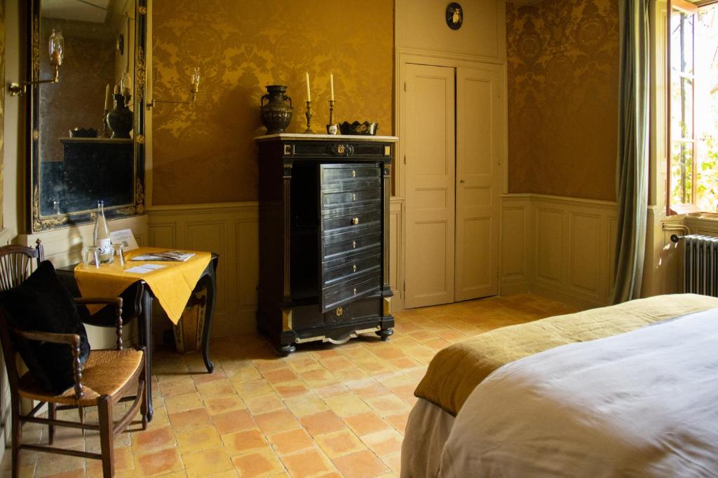 Postel nebo postele na pokoji v ubytování Le Manoir du Plessis