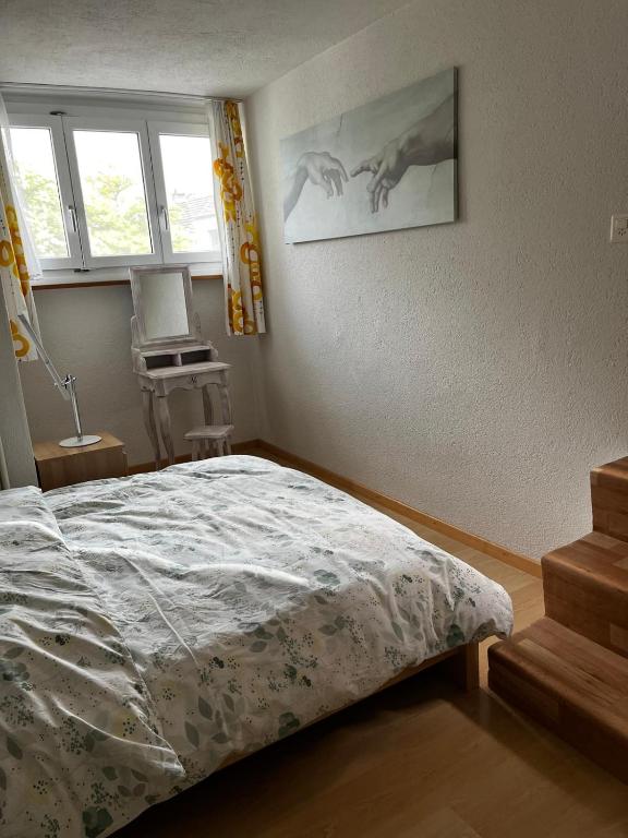 Postel nebo postele na pokoji v ubytování Zimmer am See