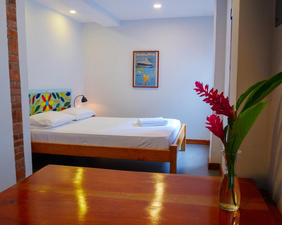 Postel nebo postele na pokoji v ubytování CASA DINIS - Apartamento Estudio