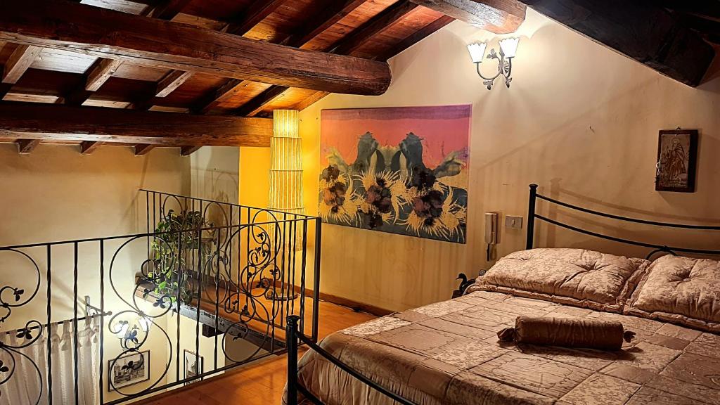 Postel nebo postele na pokoji v ubytování Antica Rupe Casa Vacanze