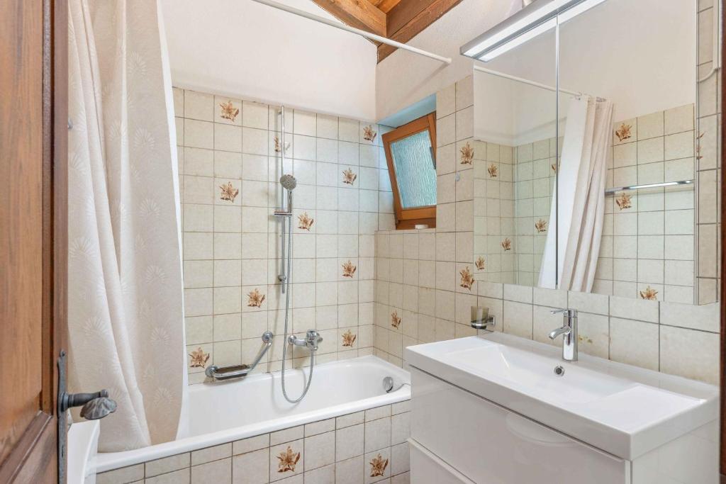 Koupelna v ubytování Residenza Paradiso App 1000