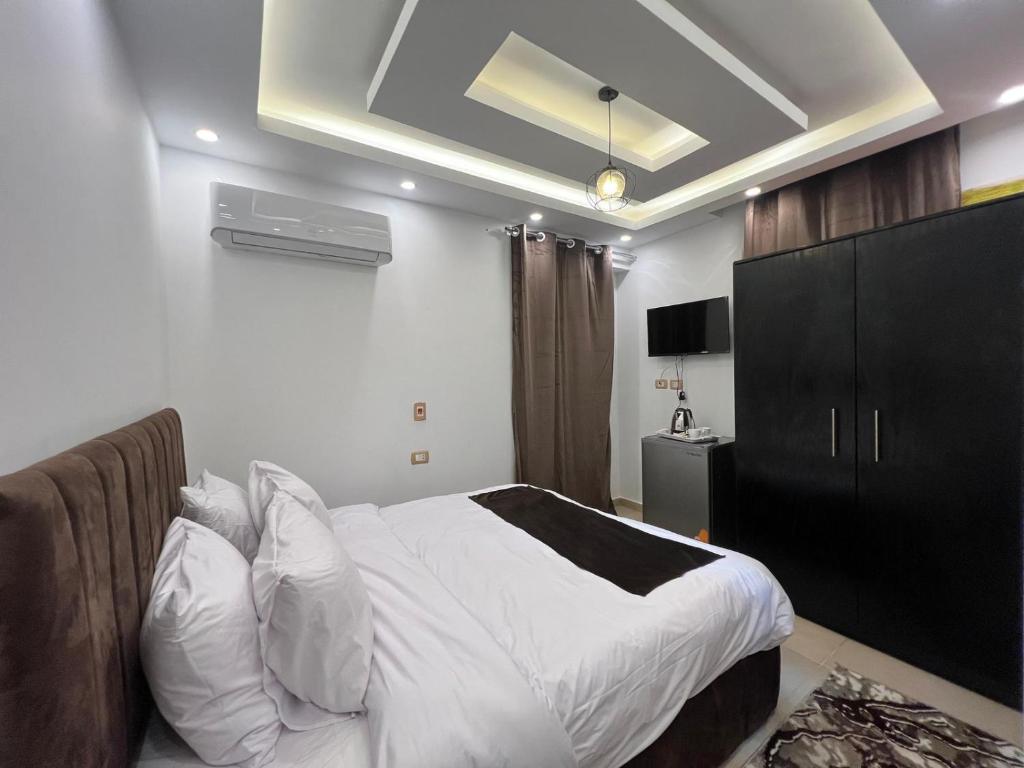 Postel nebo postele na pokoji v ubytování Memphis pyramids hotel