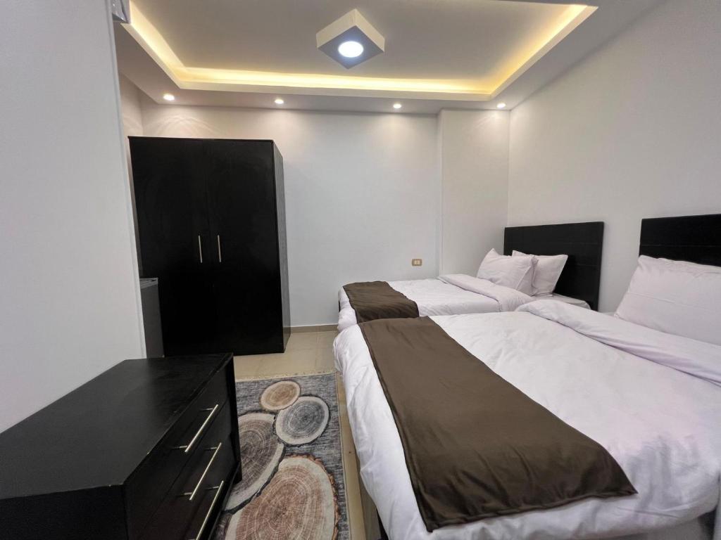 Postel nebo postele na pokoji v ubytování Memphis pyramids hotel