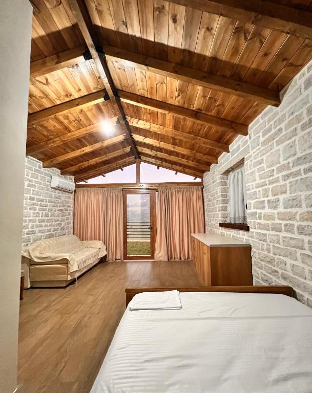 Voodi või voodid majutusasutuse Ballkoni i Goricës toas