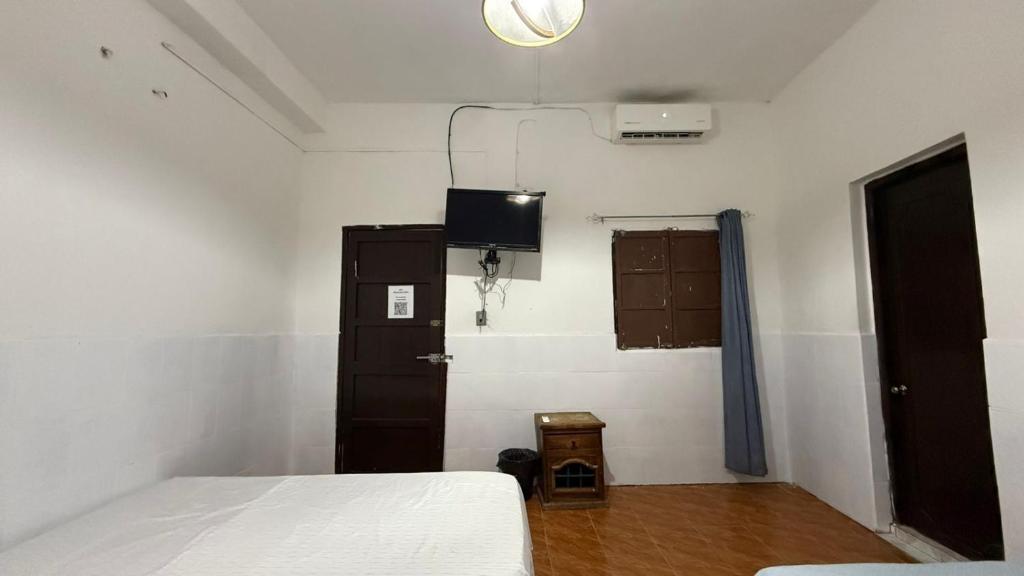 Postel nebo postele na pokoji v ubytování Hotel Climar