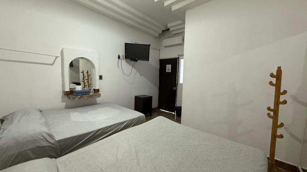 Postel nebo postele na pokoji v ubytování Hotel Climar