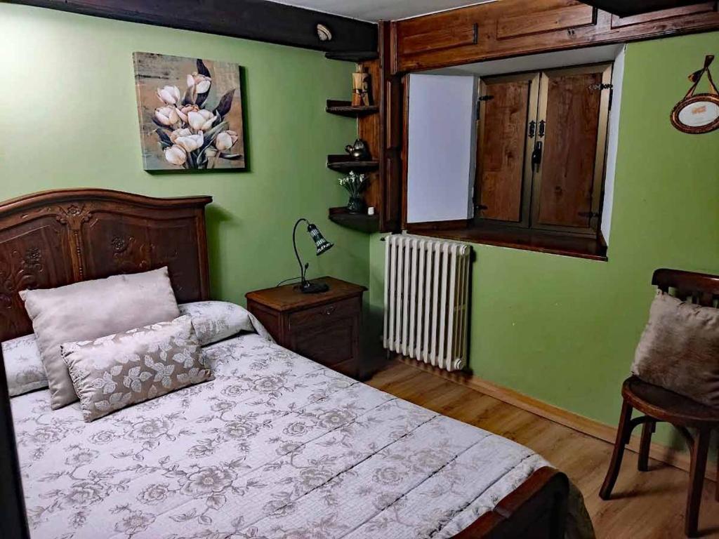 Cama o camas de una habitación en El Hayedo de Argovejo