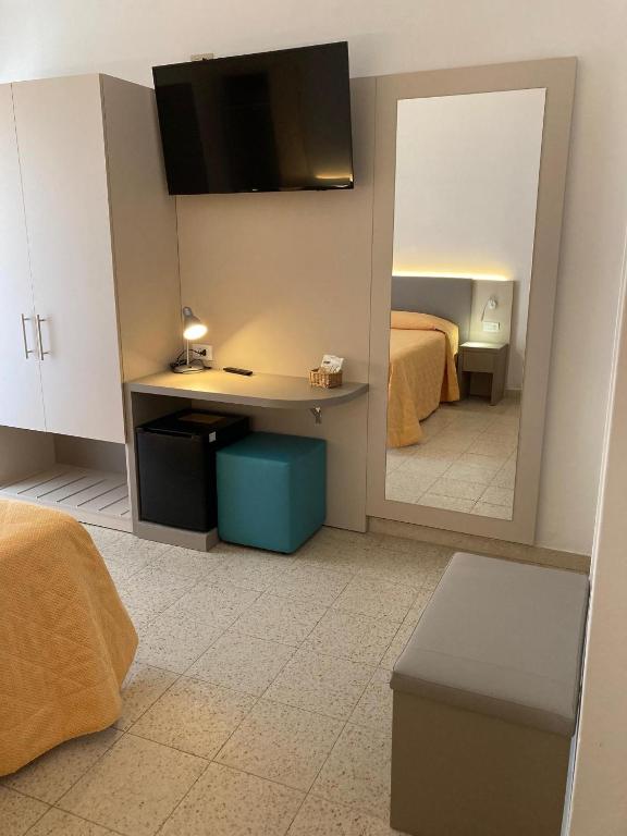 Postel nebo postele na pokoji v ubytování Hotel Giacomazzo