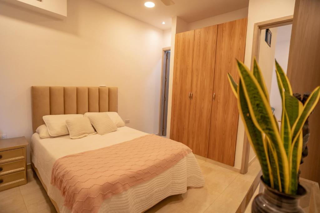 Ένα ή περισσότερα κρεβάτια σε δωμάτιο στο Casa Chongui