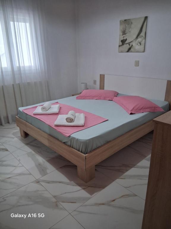 Postel nebo postele na pokoji v ubytování house chrisoula