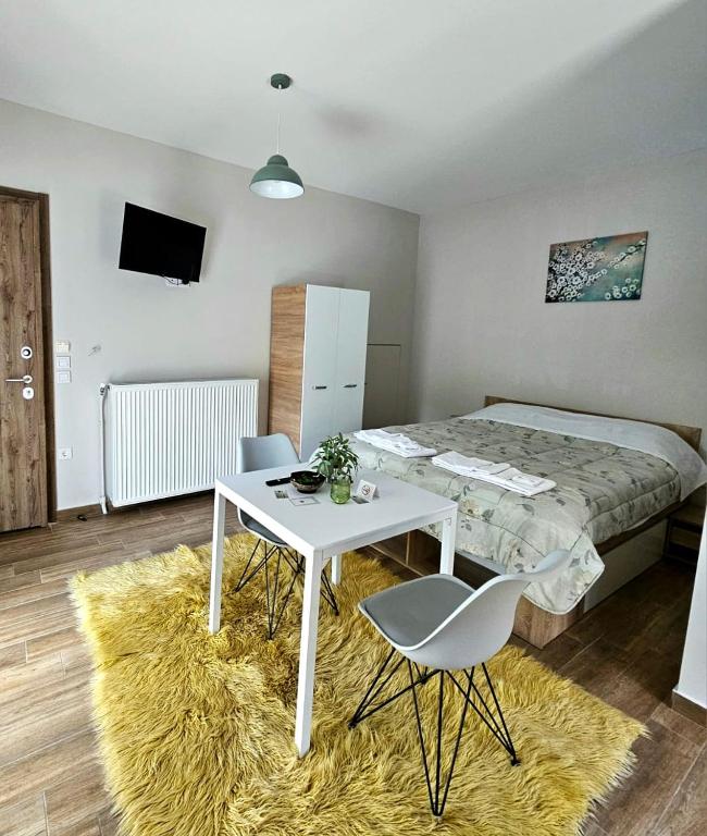 Postel nebo postele na pokoji v ubytování Studios Iris