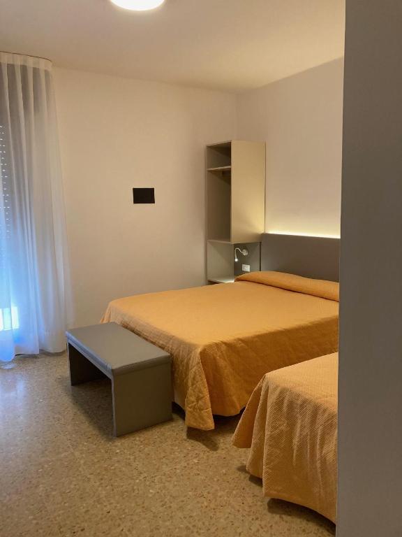 Postel nebo postele na pokoji v ubytování Hotel Giacomazzo