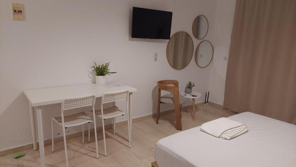 Posteľ alebo postele v izbe v ubytovaní Orama Studios