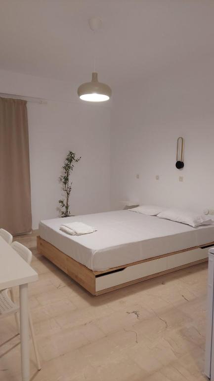 Posteľ alebo postele v izbe v ubytovaní Orama Studios