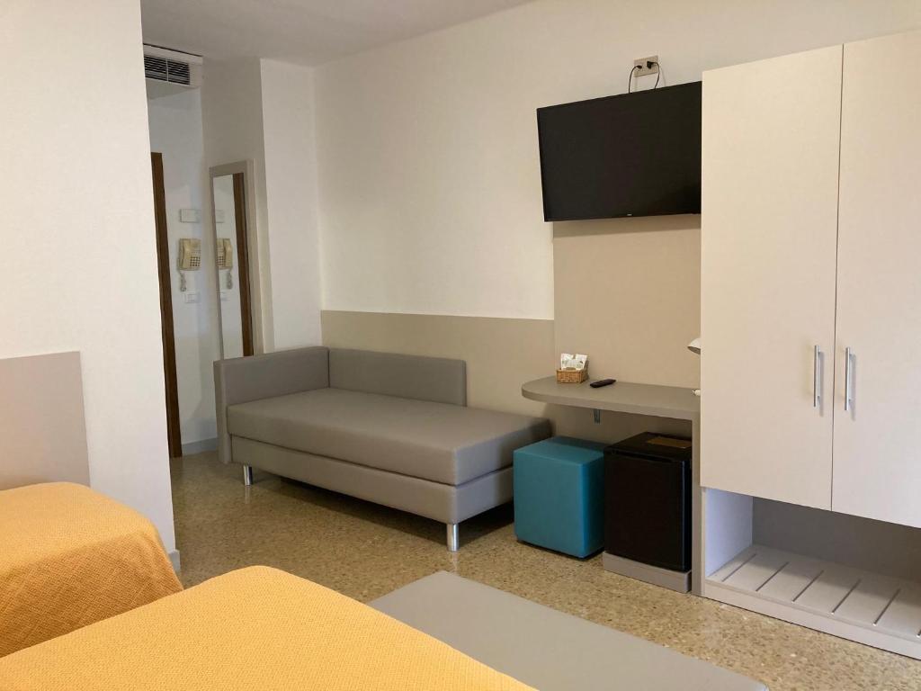 TV a/nebo společenská místnost v ubytování Hotel Giacomazzo