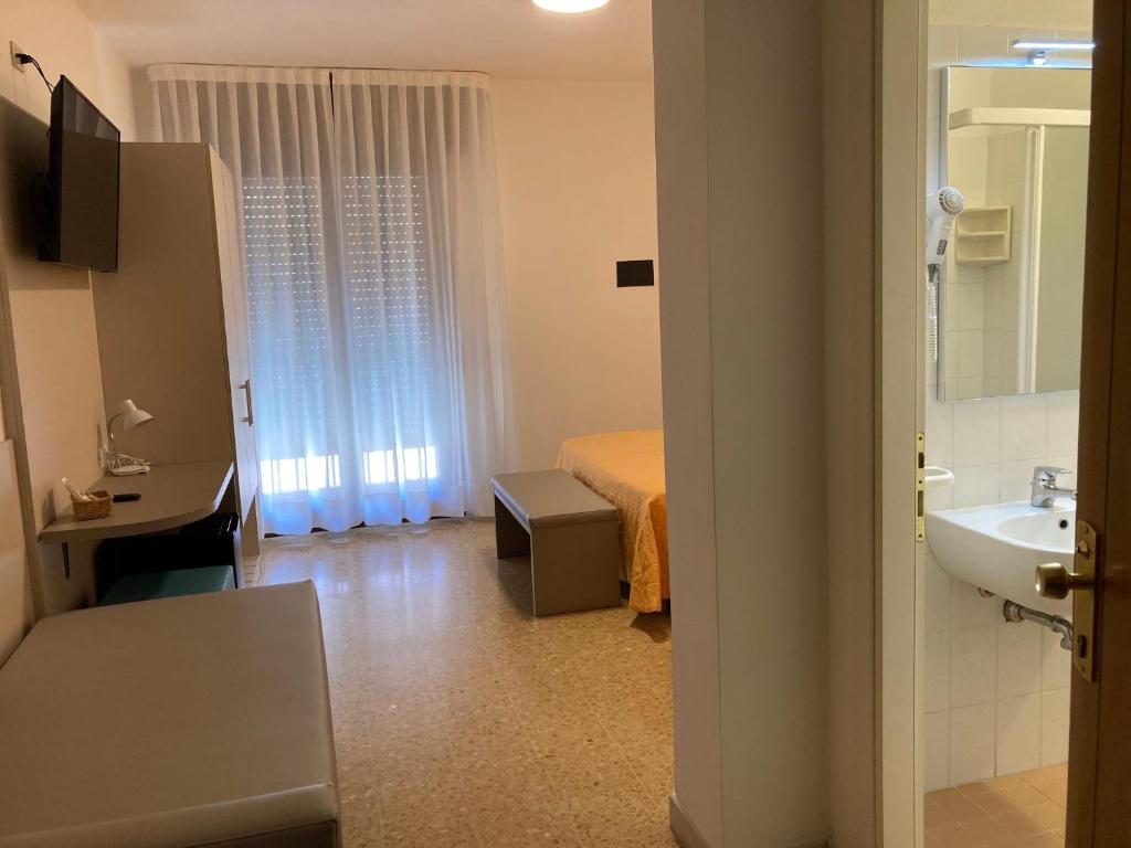 TV a/nebo společenská místnost v ubytování Hotel Giacomazzo