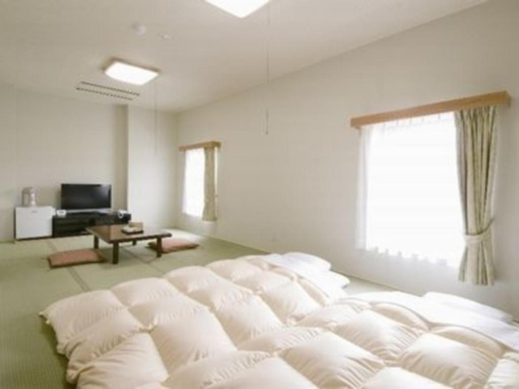 Postel nebo postele na pokoji v ubytování Hotel New Ohte - Vacation STAY 32399v