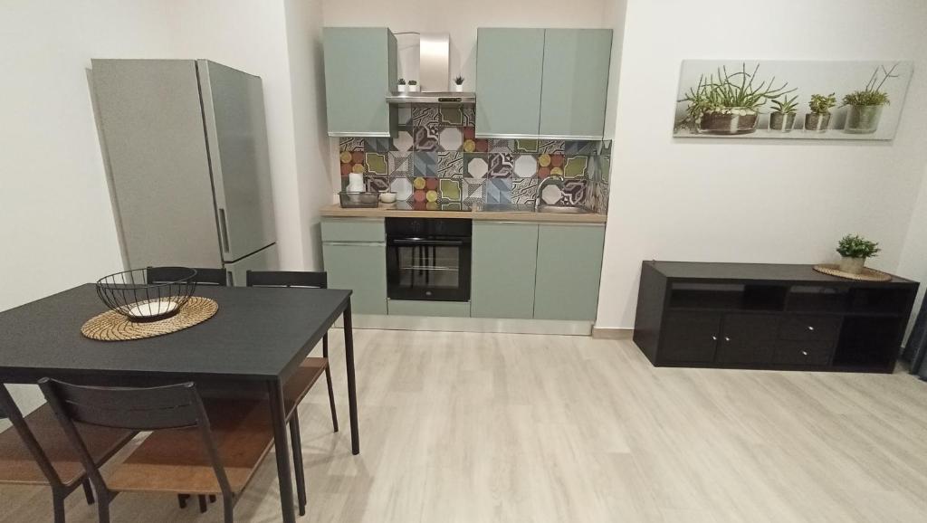 Kuchyňa alebo kuchynka v ubytovaní Gelsonero Apartments
