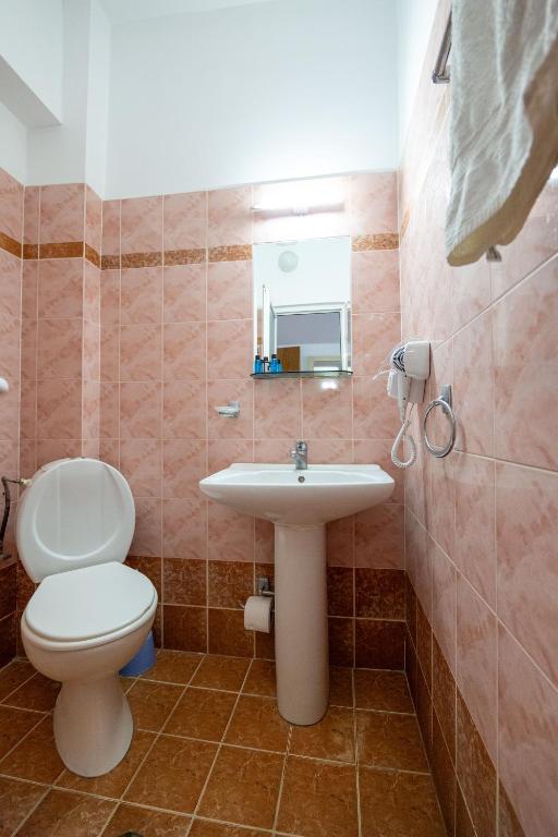 Koupelna v ubytování Classic Rooms