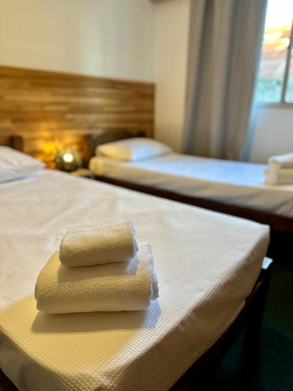 Postel nebo postele na pokoji v ubytování Del Galpón Hotel