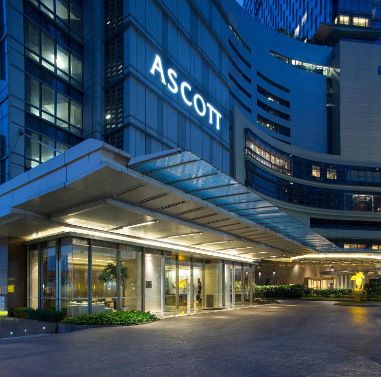 a exterior view of a asoc building at night at Ascott Kuningan Jakarta in Jakarta