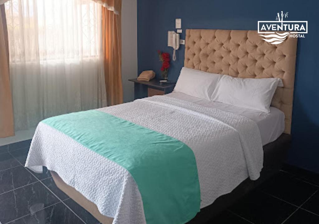 Postel nebo postele na pokoji v ubytování Hostal Aventura