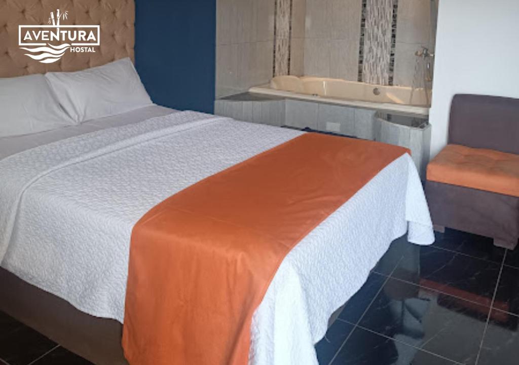 Postel nebo postele na pokoji v ubytování Hostal Aventura