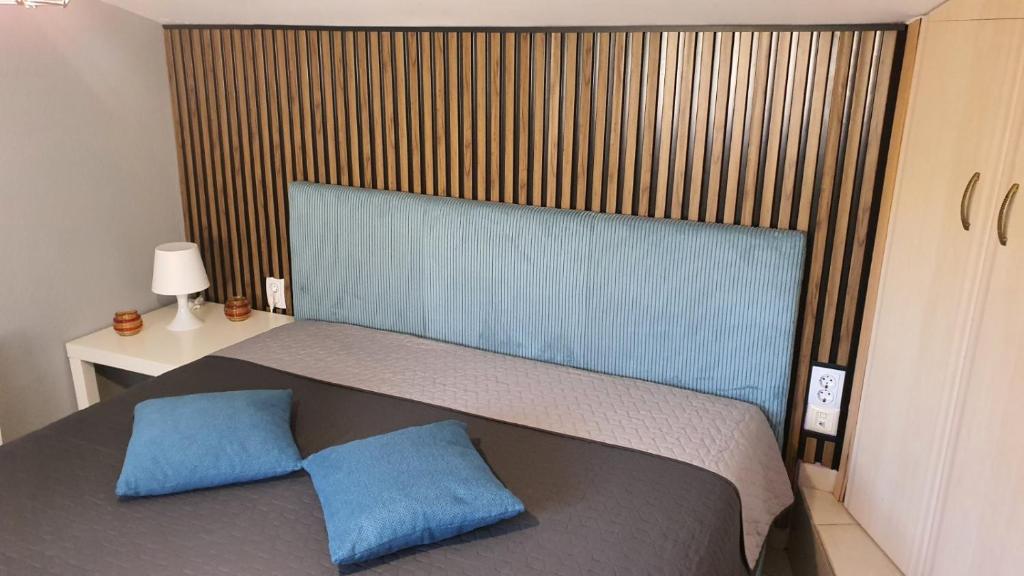 Posteľ alebo postele v izbe v ubytovaní THE VIEW APARTMENT KAVALA